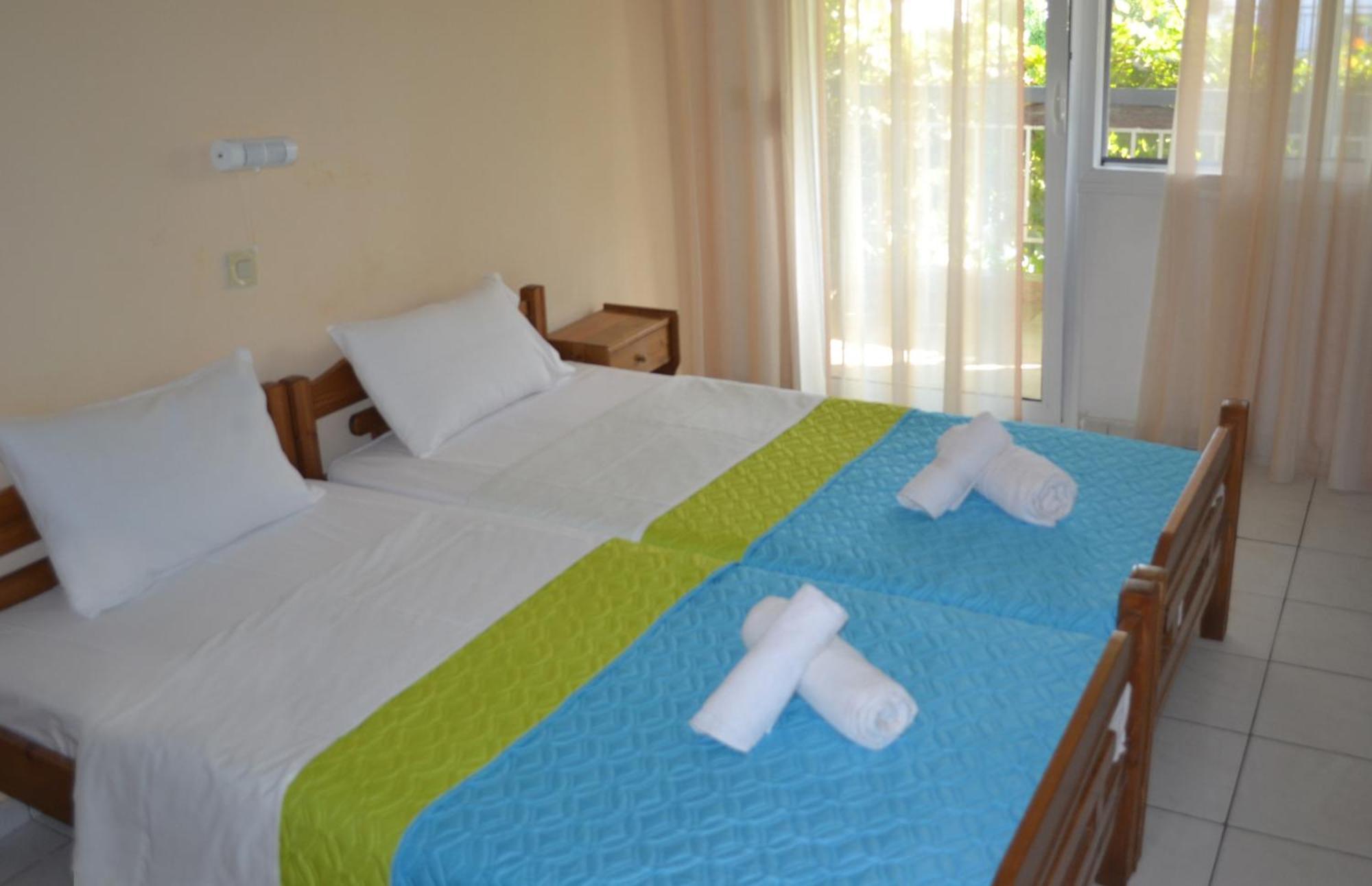Artemis Apartments Dioniszíu-part Szoba fotó